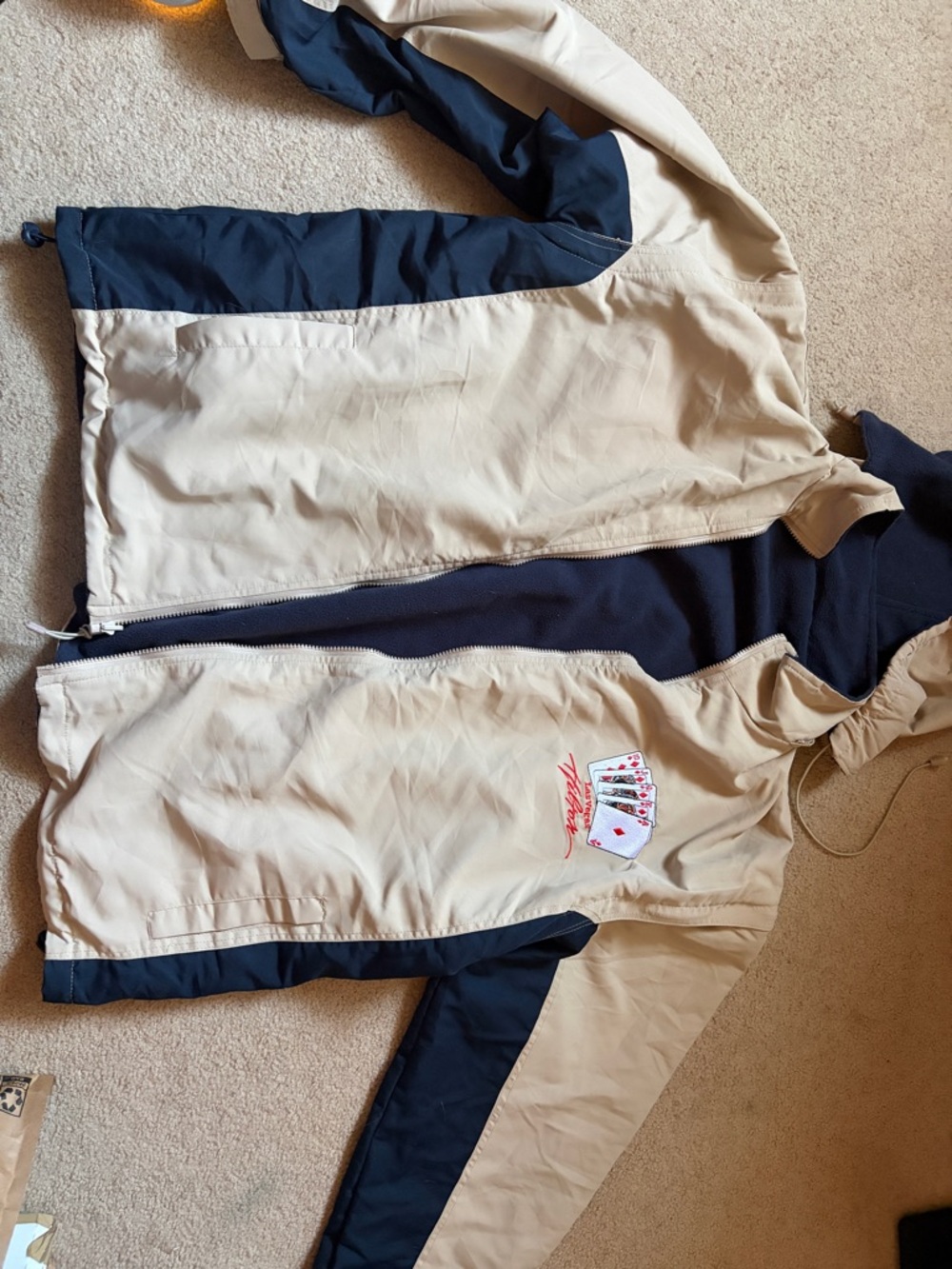 Reversible Beige and Navy Las Vegas x Hilton Poker fleece/windbreaker jacket